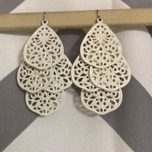 White dangling earrings